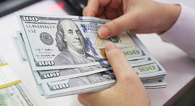UOB dự báo USD sẽ hạ nhiệt: Cơ hội nào cho VND?