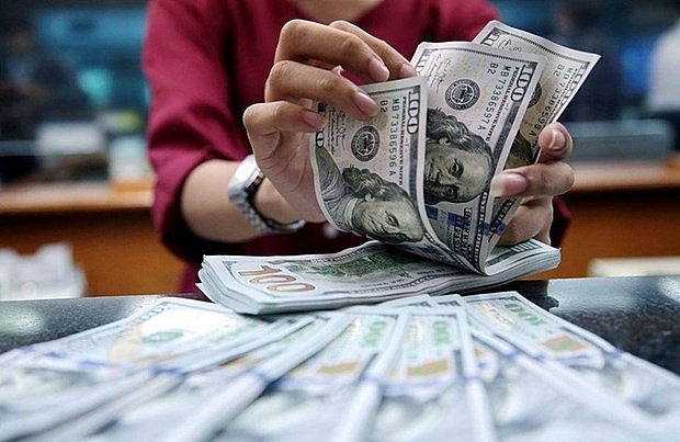 USD và Nhân dân tệ đồng loạt giảm tại các ngân hàng thương mại