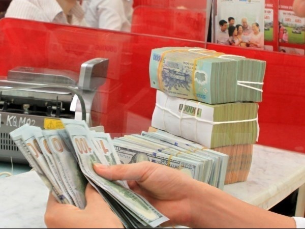 Đồng USD quốc tế lao dốc, vì sao tỷ giá ở Việt Nam vẫn leo thang?