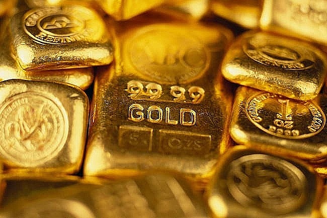 Vàng tăng mạnh nhất từ 1979, trở lại vị thế tài sản trú ẩn hàng đầu